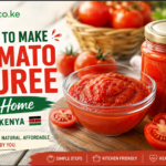 Homemade tomato puree in a glass bowl beside fresh ripe tomatoes and a jar of puree.